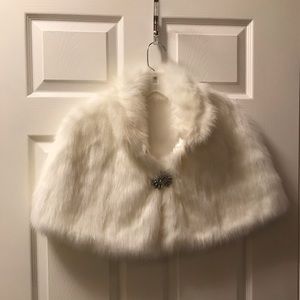 Cream colored bridal faux fur shawl.